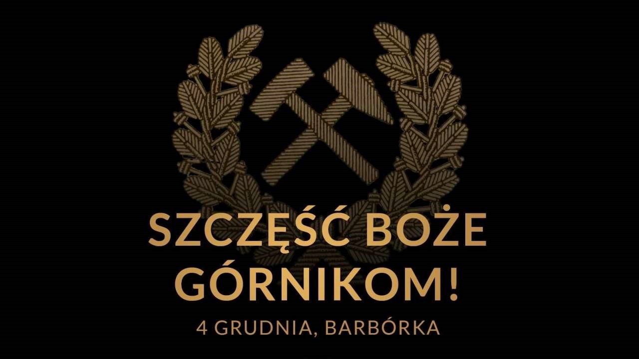 Złoty emblemat z krzyżującymi się młotami i gałązkami oliwnymi, z napisem 'Szczęść Boże Górnikom! 4 Grudnia, Barbórka' w eleganckiej czcionce na ciemnym tle. Obrazek jest uroczystym hołdem dla polskich górników z okazji Dnia Barbórki, obchodzonego 4 grudnia.